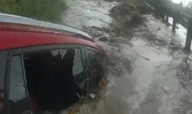 Watch: Arizona police rescues woman trapped inside car stuck in flood waters