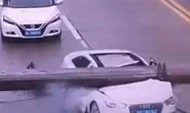 Watch: Man miraculously escapes pole falling on Audi