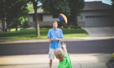 Spiraling footballs wobble at one of two specific frequencies