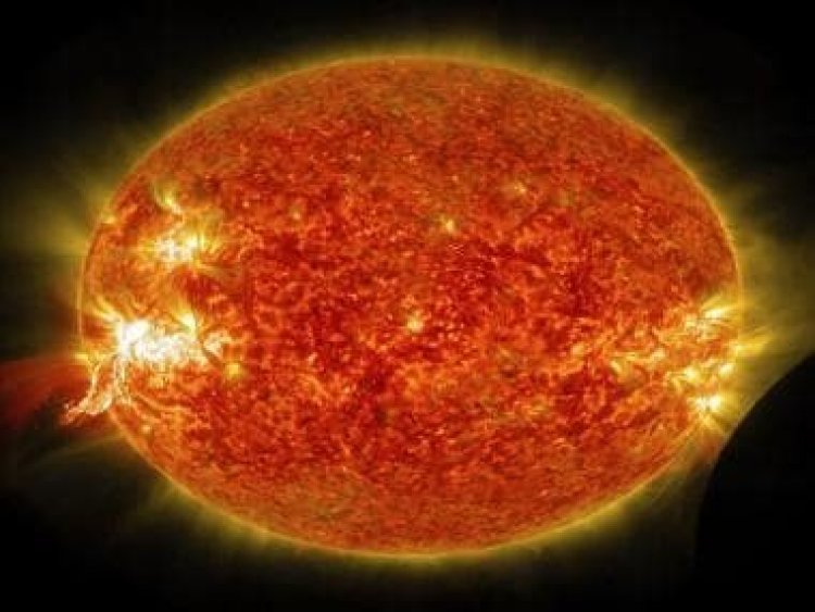 What are solar flares that can reach temperatures up to 100 million degrees?
