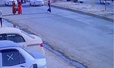 Careless woman miraculously escapes getting hit by car; watch