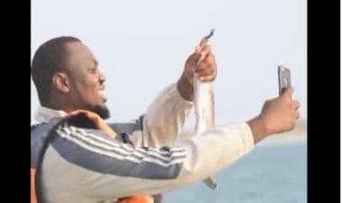 Video of man flinging his phone in water instead of fish goes viral