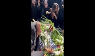 Watch: Woman chops hair at brother's funeral who was killed in Iran protests