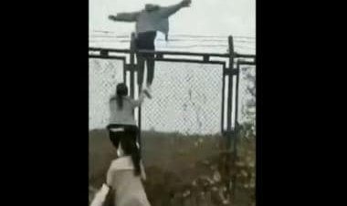 Watch: Workers flee COVID-19 lockdown at China's biggest iPhone factory