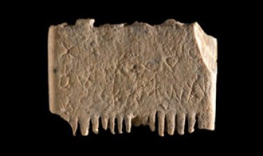 This ancient Canaanite comb is engraved with a plea against lice