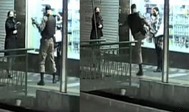 WATCH: Armed cop kicks, punches woman pedestrian on busy street in Iran's capital