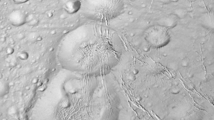 Enceladus is blanketed in a thick layer of snow