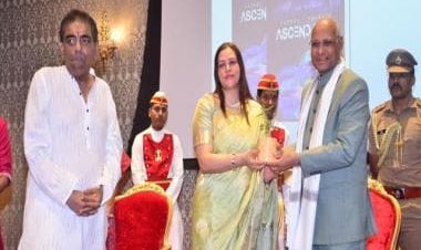 Ms Nidarshana Gowani gifts Tulsi sapling to the Governor of Maharashtra at an event on Earth Day