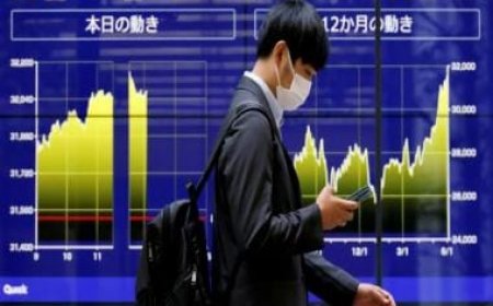 Asian stock markets extend global rally, oil prices rise after Saudi Arabia pledged output cuts