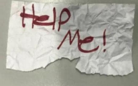 Help Me! 13-yr-old girl rescued after flashing handwritten sign from kidnapper's car