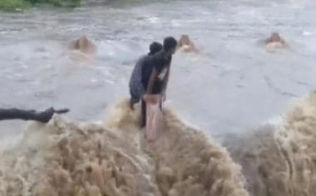 WATCH: Two youths rescued with hydraulic crane from flooded bridge in Udaipur's Morwaniya