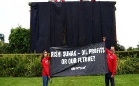 Rishi Sunak's London home draped in black by protesters over oil policy