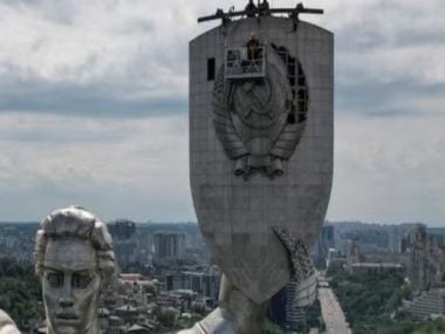 To wipe out vestiges of Russian influence, Ukraine removes Soviet-era hammer, sickle from Kyiv monument