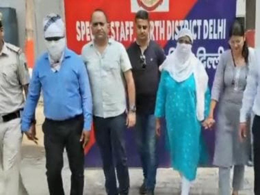 WATCH: Senior Delhi govt officer accused of raping friend's daughter tries to escape with wife ahead of arrest