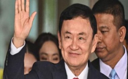 Thailand’s king reduces former Prime Minister Thaksin’s 8-year prison term to a single year