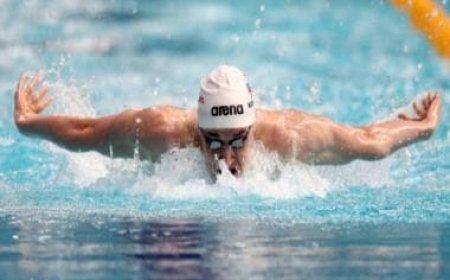 Russia criticizes rules allowing some of its swimmers to compete as neutrals ahead of Olympics