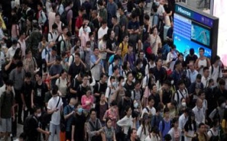 As economic decline hits, record number of Chinese to spend holidays at home