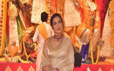 Rani Mukerji looks stunning as she arrives for Durga Puja celebrations in golden saree