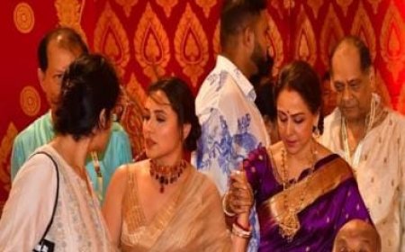 Rani Mukerji holds Hema Malini's hand at the Durga Puja celebrations, helps her to the stage