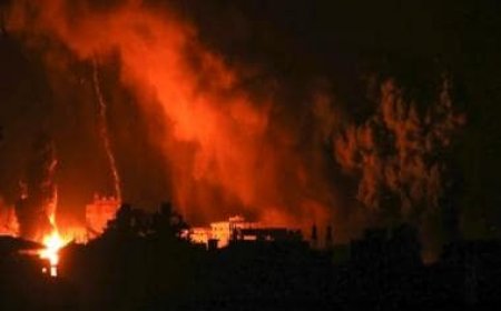 Israeli warplanes hit refugee camps, military says it has cut 'Gaza Strip into two'