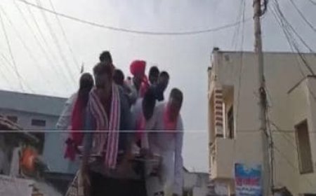 VIDEO: Telangana minister KTR Rao falls down from vehicle during election rally in Nizamabad