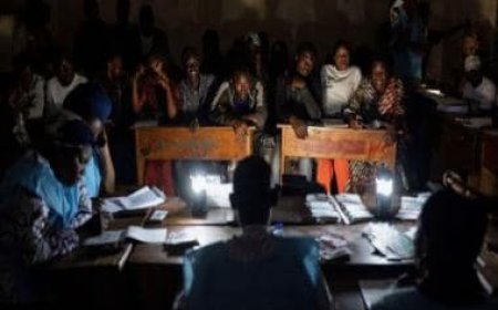 Congo votes in extended election while opposition demands a repeat
