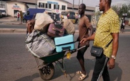 Nigeria slashes transport fees during the holidays to ease some of the pain of austerity measures