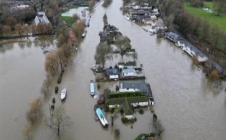 UK hit by flooding after heavy rain swells major rivers