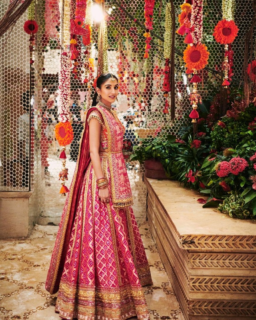 Decoding Radhika Merchant’s Mameru Ceremony Look: Bride-to-Be Stuns in 35-Meter Bandhej Lehenga with Durga Maa Shloka and Heirloom Jewellery