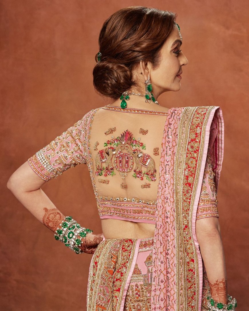 Nita Ambani Styles Her Pink Ghagra With One-of-a-Kind Blouse, Weaves Names of Grandchildren, Shlok and Kashi Temples Over it
