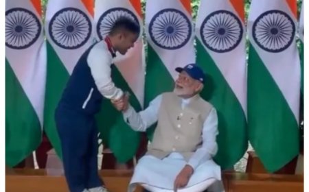 Watch: PM Narendra Modi sits on the floor to receive cap from Paralympic javelin star Navdeep Singh