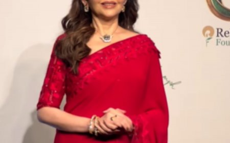 Nita Ambani channels retro glamour in fiery red saree while hosting India’s Olympic and Paralympic champions